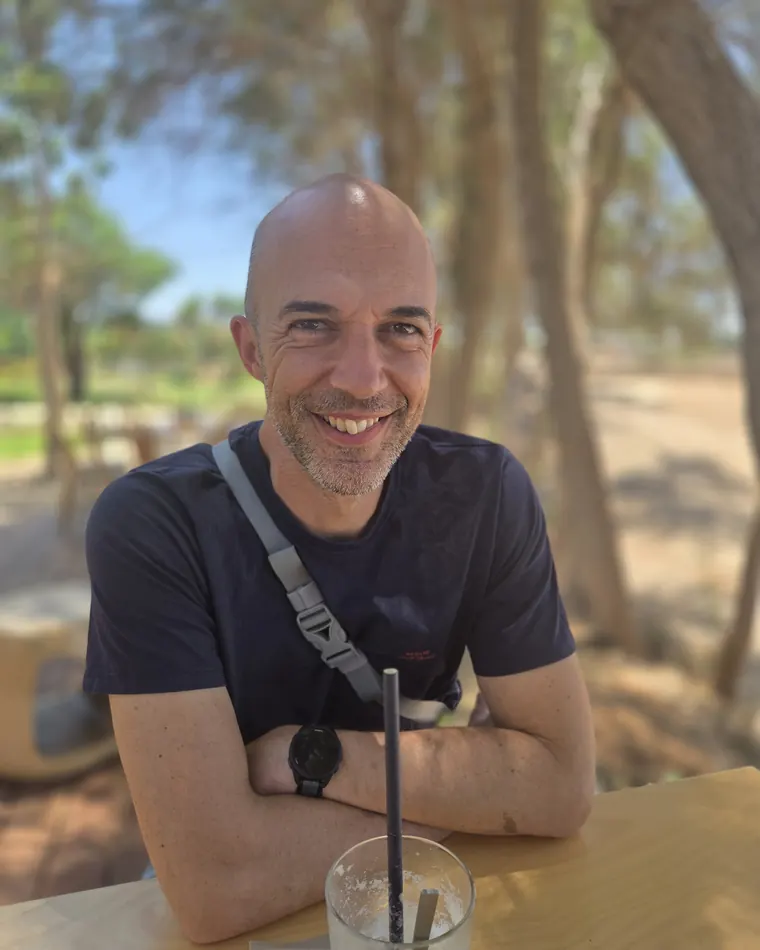 Lee Sykes sitting outside in Cyprus